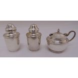 Silver three piece condiment set to include a mustard pot with blue glass liner, a pepperette and