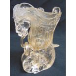 A Chinese rock crystal libation cup carved in the form of a mythological beast, 12.5cm (h)