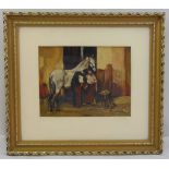 A framed oil on panel of a farrier shoeing a horse in a stable, indistinctly signed bottom right,