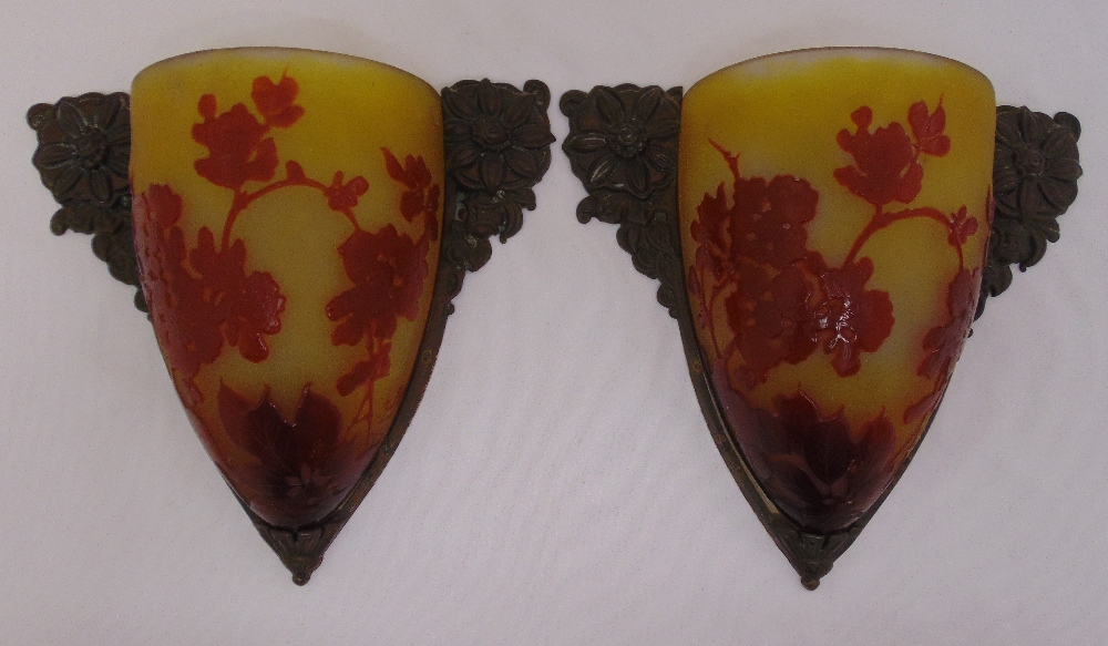 A pair of Galle Art Deco glass wall lights, cameo etched with flowers and leaves and with brass