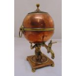 A mid a 19th century brass and copper samovar of globular form supported by the figurine of Atlas on