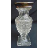 A cut glass vase on raised rectangular base with plain hallmarked silver collar 24cm (h)