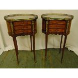 A pair of French style kidney shaped side tables, with brass galleries and mounts, three drawers