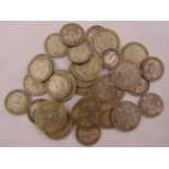 A quantity of pre 1947 GB silver coins to include florins and shillings, approx total weight 242g