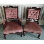 A matched pair of Victorian upholstered occasional chairs on turned cylindrical legs