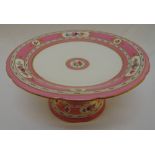 Minton cake stand pink and white ground with floral sprays on raised circular base, 23.5cm