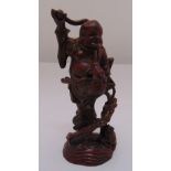 A Japanese Meiji period bronze figurine of Buddha with a frog on naturalistic base, 16cm (h)