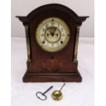 An Edwardian mahogany and satinwood inlaid bracket clock, enamel dial, Arabic numerals, two train