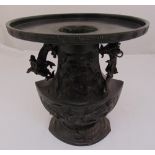 An Oriental Ikebana Usubata bronze vase with stylised cast animals and applied dragon side