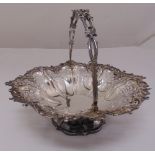 A Victorian silver fruit basket, scroll pierced sides, floral and leaf border with pierced swing