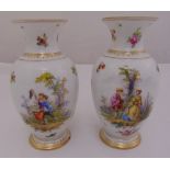 A pair of KPM Berlin baluster vases decorated with courting couples, flowers and leaves, marks to