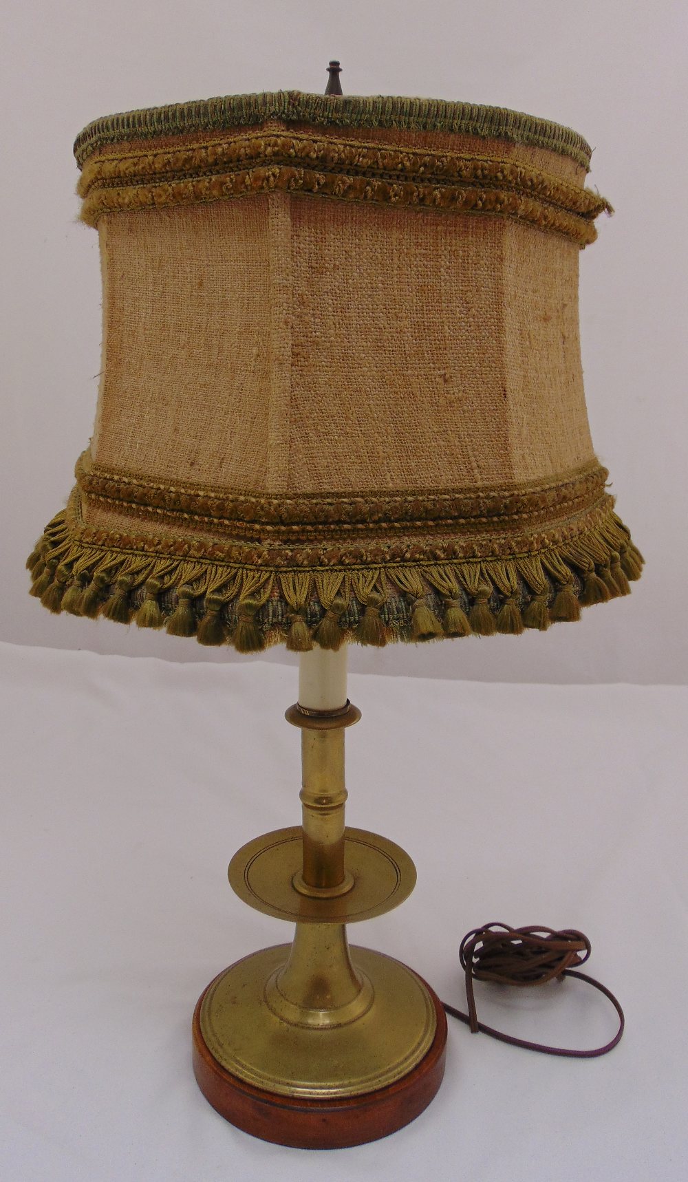 A brass table lamp with circular sections to include shade, 62cm (h)