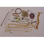 A quantity of costume jewellery to include necklaces, bracelets and a ring