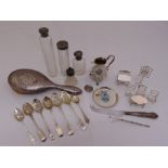 A quantity of silver and white metal to include a Georgian cream jug, six antique berry spoons,