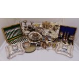 A quantity of silver plate to include cased fish eaters, entrée dishes and covers and condiment