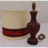 A Chinese cinnabar lacquer table lamp on circular hardwood base to include shade, 36cm (h)