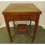 A mahogany envelope card table, the single drawer with brass handles on four tapering rectangular
