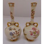 A pair of Royal Worcester blush ivory vases decorated with flowers, leaves and gilded side