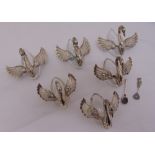 Six cut glass salts in the form of swans with hallmarked silver and white metal wings, heads and