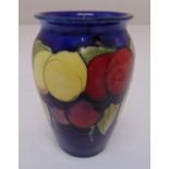 Moorcroft baluster vase blue ground decorated with fruit, marks to the base, 16cm (h)