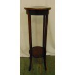A mahogany plant stand with circular top with four outswept supports, 99cm (h)