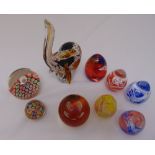 Eight glass paperweights of various form, colour and make. Tallest 23cm (h)