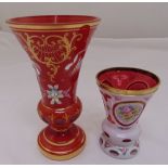 A red Bohemian glass vase, gilded and decorated with flowers, 24cm (h) and a white Bohemian glass