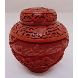 Chinese cinnabar lacquer ginger jar and cover carved with landscape scenes and stylised scrolls