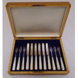 A cased set of silver and Mother of Pearl desert knives and forks, Sheffield 1911 by The Dixons
