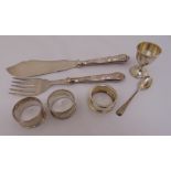 A quantity of silver to include napkin rings, an egg cup and fish servers (7)