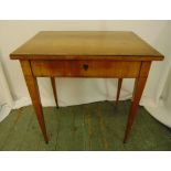 A rectangular mahogany dressing table, the hinged cover revealing compartmentalised interior all