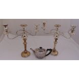 A pair of silver plated candelabra and a Mappin and Webb silver plated teapot