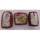 Three Chinese rectangular lacquered boxes , the pull off covers decorated with figures and flowers