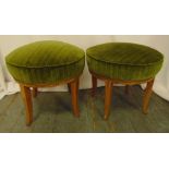 A pair of circular upholstered stools on four outswept legs, 44.5 x 50cm