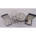 A quantity of costume jewellery to include a Thomas Sabo bracelet, a silver and amber necklace,