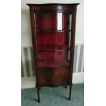 An Edwardian mahogany glazed display cabinet with bow fronted hinged glass door and satinwood inlays
