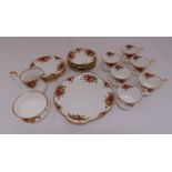 Royal Albert Old Country Roses tea set for six place settings to include a cake plate, plates, cups,