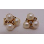 A pair of cultured pearl, diamond earrings set in yellow gold tested 18ct