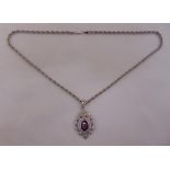 9ct white gold ruby and white sapphire pendant on a 9ct white gold chain, approx total weight 15.8g