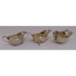 Three silver sauce boats of varying style and form, all fully hallmarked, approx total weight 351g