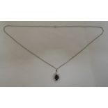 18ct white gold chain with an 18ct gold pendant set with a sapphire and diamonds, approx total