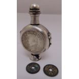 A Chinese white metal snuff bottle with inset coins, marks to the base and two antique Chinese