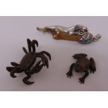 Two Japanese Meiji period bronze figurines of a frog 4.5cm (l), a crab 6cm (l) and a deer horn