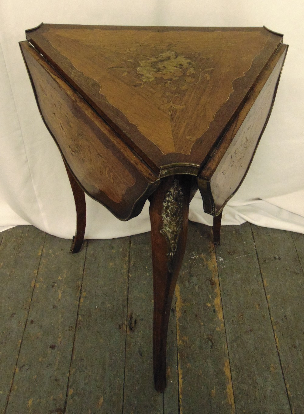 A mahogany and satinwood inlaid triangular drop flap hall table on three cabriole legs, A/F