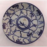 A 17th century Chinese blue and white provincial plate, marks to the base, 16.5cm (d)