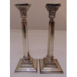 A pair of hallmarked silver table candlesticks, London 1931, approx total weight 610g