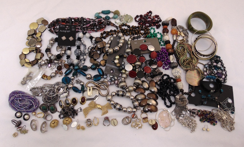 A quantity of costume jewellery to include necklaces, bracelets, earrings, rings and brooches