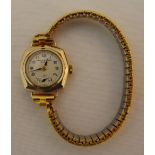 Mappin and Webb 9ct gold ladies wristwatch on a gold plated expanding bracelet