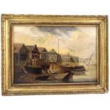 A framed 19th century oil on board of boats by a dock, 23 x 33.5cm