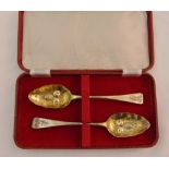 A pair of 19th century silver berry spoons in fitted case, London1812 by Sarah and John William